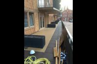 Groot balkon bestraten