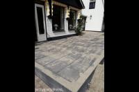 Verhoogd terras van betontegels aanleggen