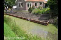 Beschoeiing plaatsen langs slootkant