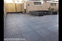 Achtertuin bestraten