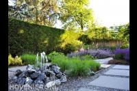 Waterornament in border met split en siergras