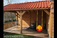 Houten overkapping met pannendak en vlonder
