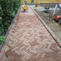 Peetoom Bestrating en Tuinaanleg