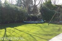 Kunstgras met ingebouwde trampoline