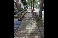 Herstraten van stoep
