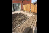 Achtertuin bestraten