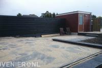 Achtertuin bestraten