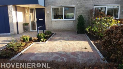 Voortuin aanleggen met bestrating en nieuwe beplanting