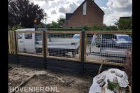 Schutting met betongaas schermen