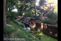 Beschoeiing en trap bij tuin langs waterkant 1