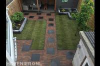 Tuinaanleg met gazon van graszoden en sierbestrating
