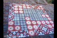 Bestrating met klinkers en mozaïek tegels