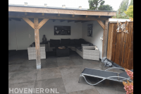 Sierbestrating onder overkapping