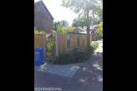 Plaatsen van hout beton schutting met betongaas panelen 2