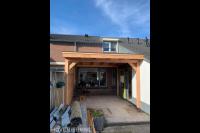 Houten overkapping aan woning