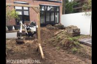 Tuin afgraven met minigraver