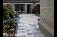 Achtertuin bestraten