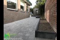 Zijtuin bestraten