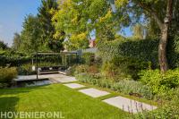 tuin aanleggen met tuinoverkapping via tuinrenovatie-florera.nl