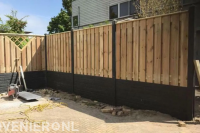 Hout beton schutting plaatsen