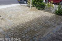 Oprit bestraten met kasseien