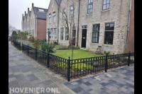 Sierhekwerk rondom voortuin