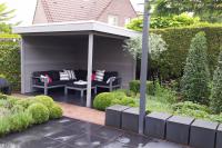 Strakke moderne tuin met overkapping 1