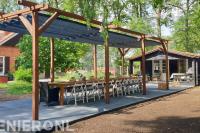 Terras van Schellevis met hardhouten schaduw pergola gemaakt.