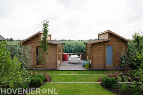 Houten tuinhuisjes op vlonder