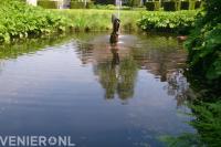 Vijver met waterornament