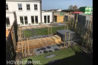 Tuinaanleg met bestrating, gazon, vlonder en jacuzzi
