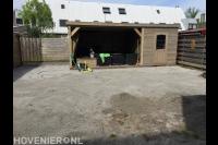 Grond voor tuinhuis met veranda voorbereiden voor straatwerk