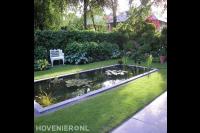 Strakke vijver in achtertuin