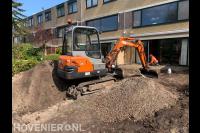Tuin afgraven met minigraver