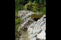 Natuurlijke vijver met oever in rotsmotief 3