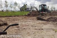 Tuin afgraven met minigraver