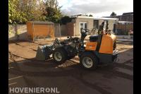 Grond egaliseren met minishovel