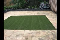 Nieuwe bestrating en kunstgras