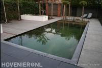 Tuin met zwemvijver, vlonder en pergola