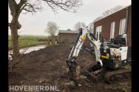 Tuin afgraven met minigraver