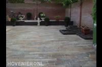 Bestrating van achtertuin met oude stenen