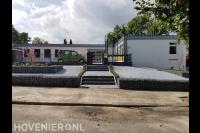 Onderhoudsvriendelijke tuin met grind en schanskorven