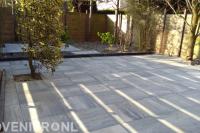 Bestrating van natuursteen tegels