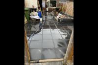 Achtertuin bestraten met betontegels