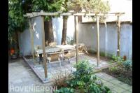 Houten pergola boven terras