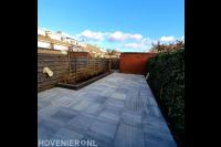 Achtertuin bestraten met keramische tegels