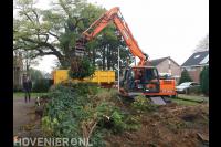 Tuin leeghalen met graafmachine 1