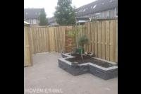Houten schutting met poort