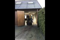 Boomstronk verwijderen met minikraan