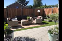 Terras bestraten en kunstgras leggen